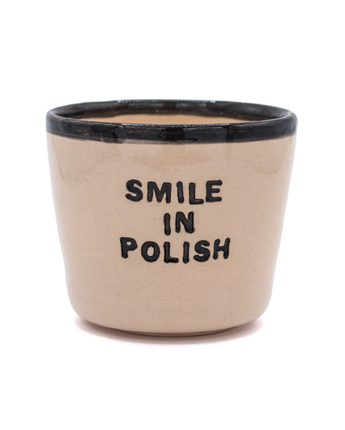 ceramiczny kubek z napisem "smile in polish"