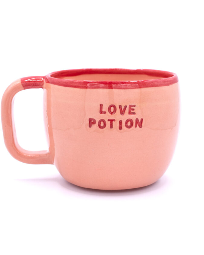 ceramiczny kubek z uchem i napisem "love potion"